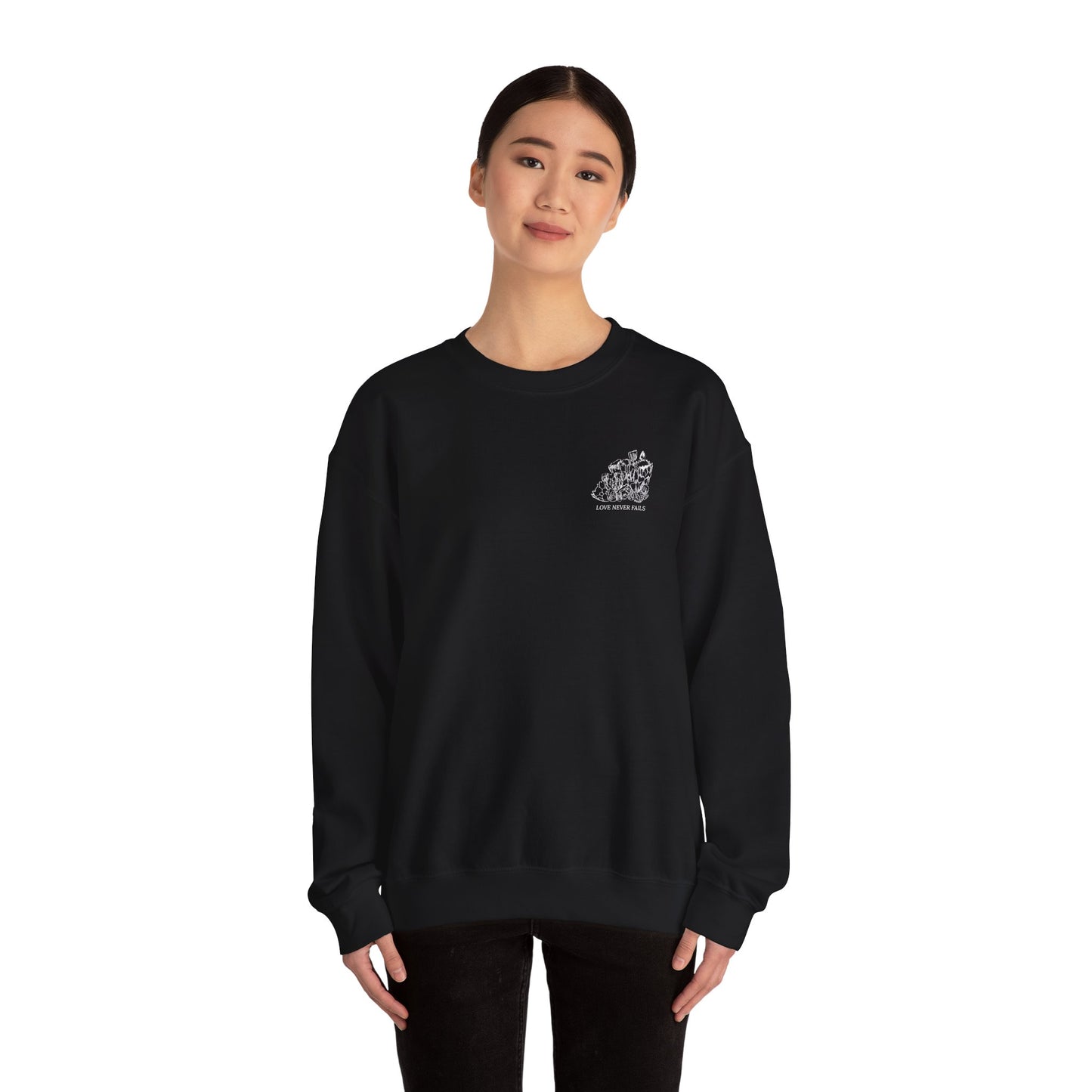 LOVE NEVER FAILS Unisex Heavy Blend™ Crewneck Sweatshirt